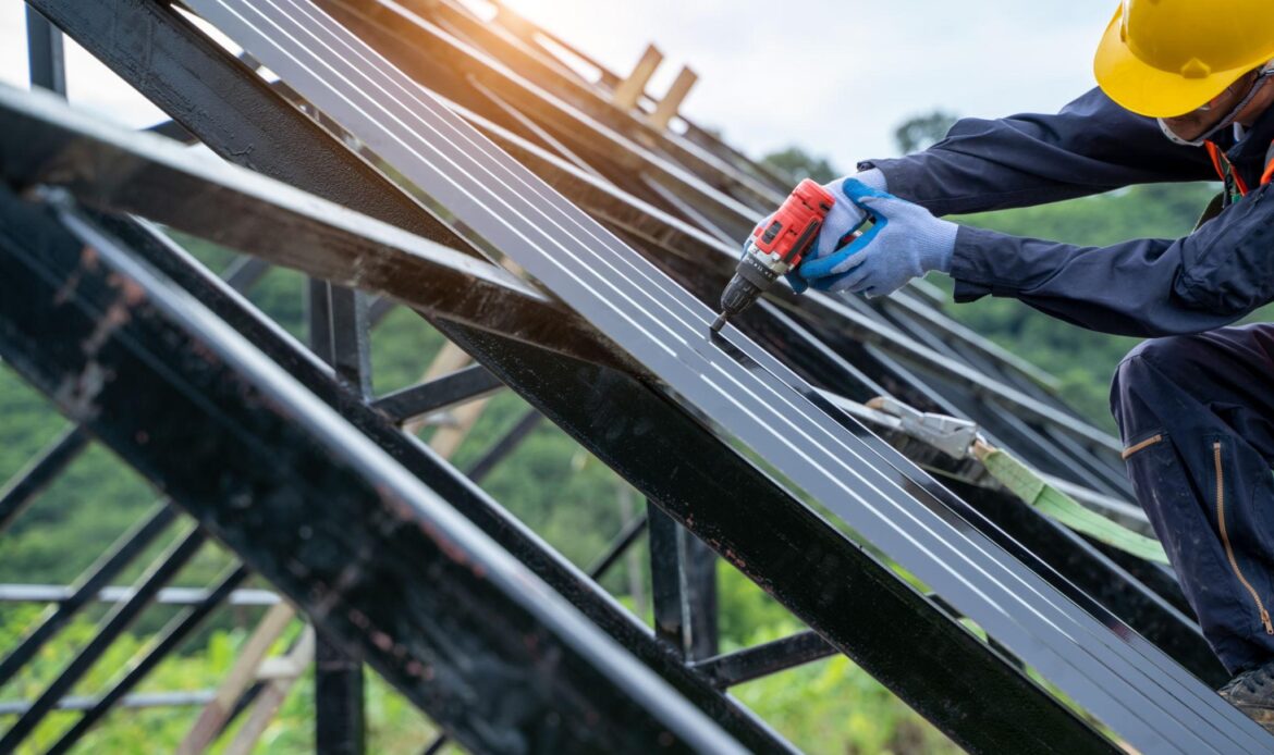 A man working on a roof using powered tools
