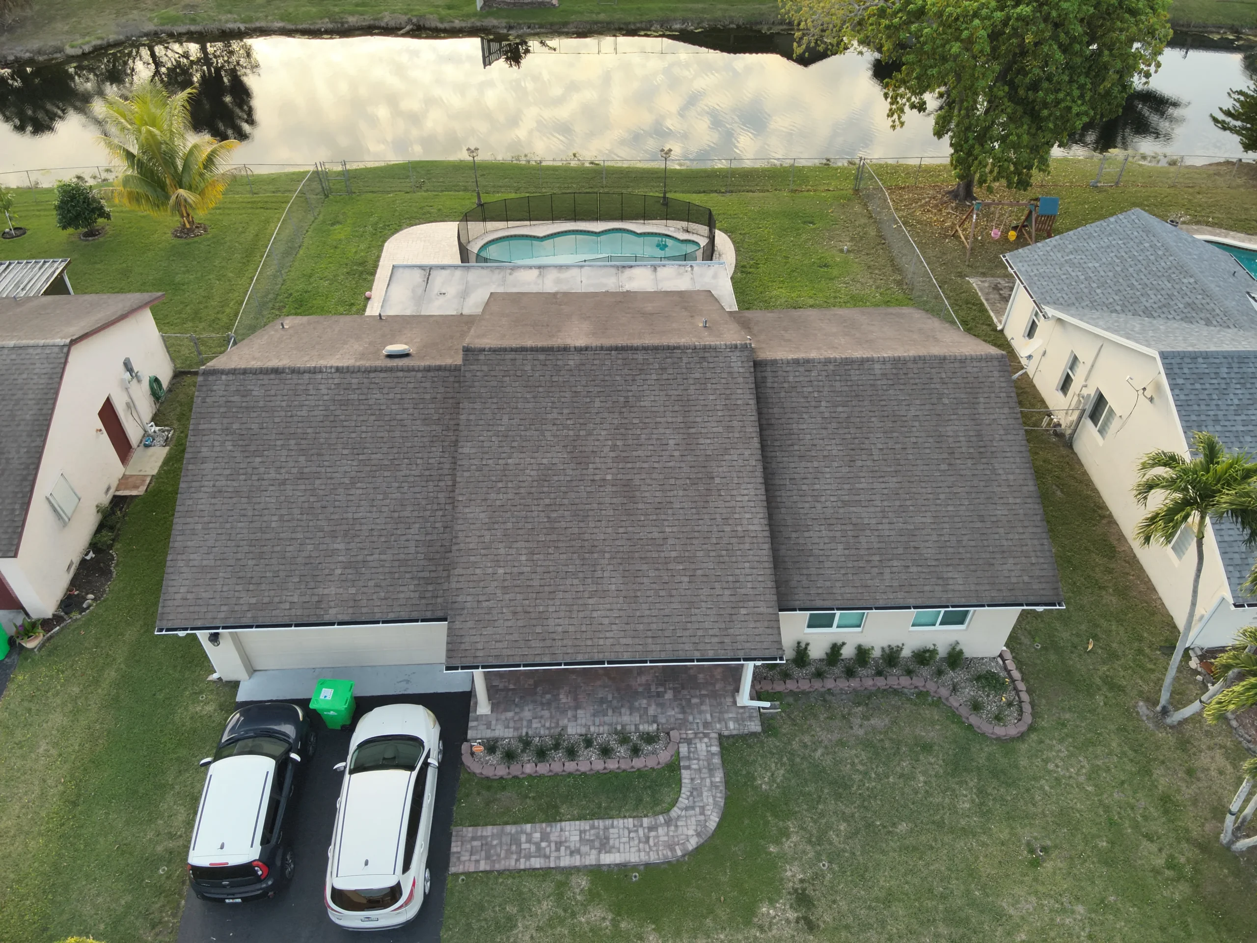 Drone view of residential asphalt shingle roof