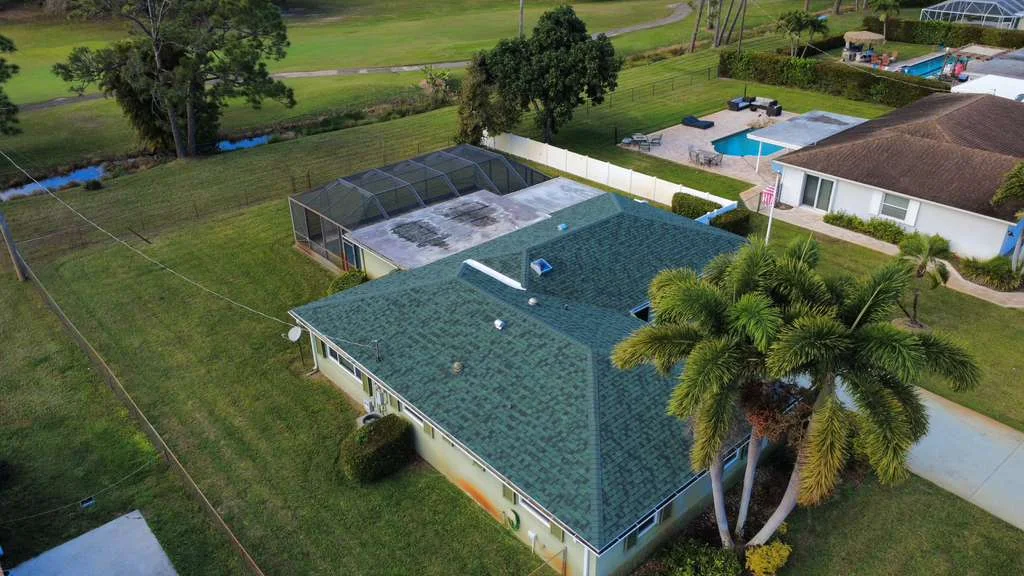 Green Architectural Shingle Roof Installation