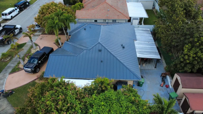 Completed blue standing seam metal roof side view in Miami, Florida