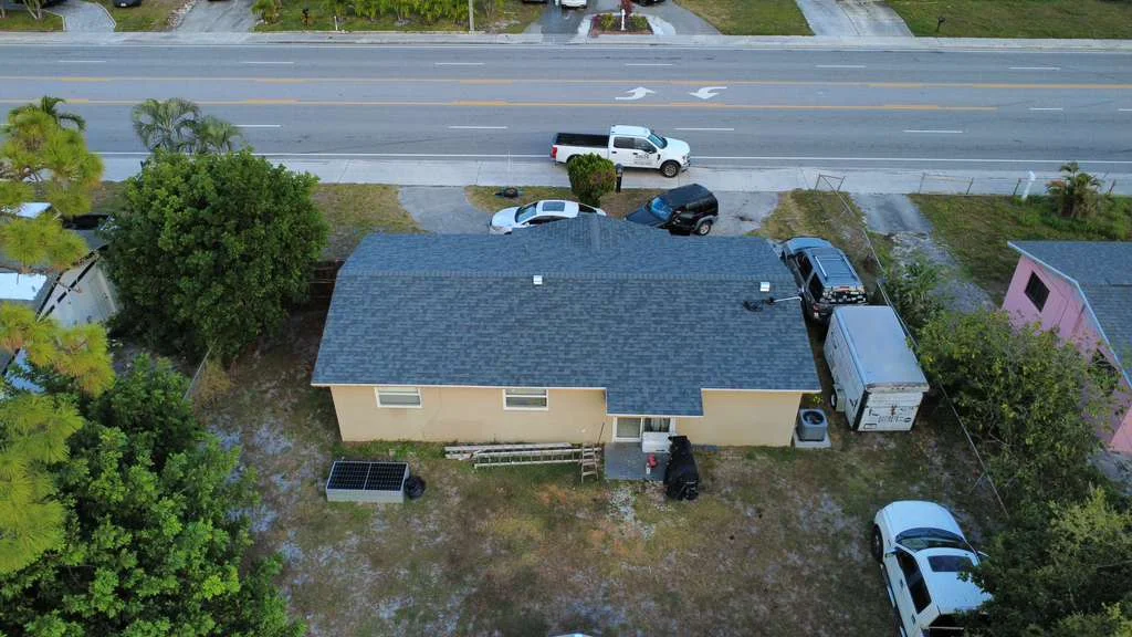Backyard aerial view of new roof system
