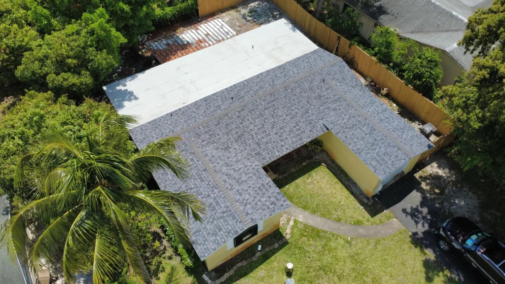 Aerial perspective of a completed residential gray shingle roof