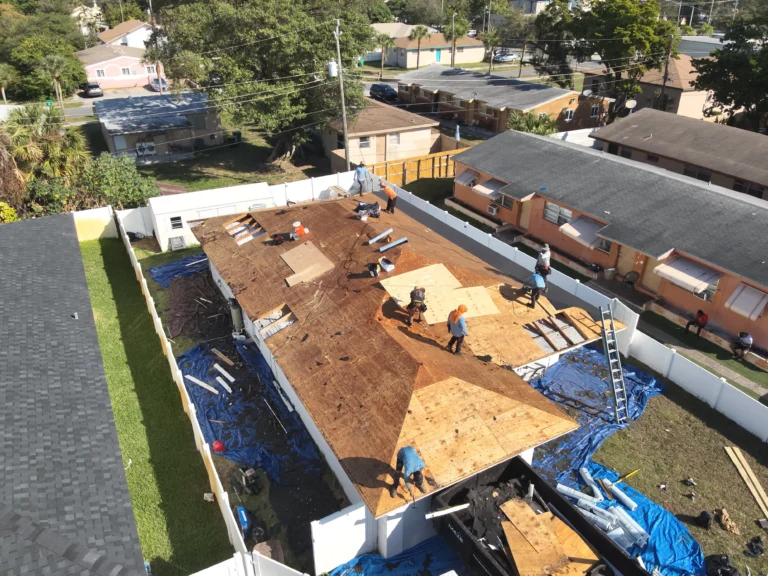 Shingle roof replacement in progress in Miami, Florida, tear-off and deck preparation