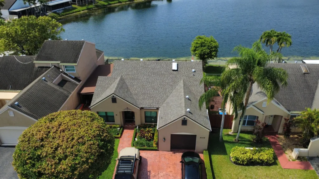 Front aerial view of newly installed architectural shingle roof.