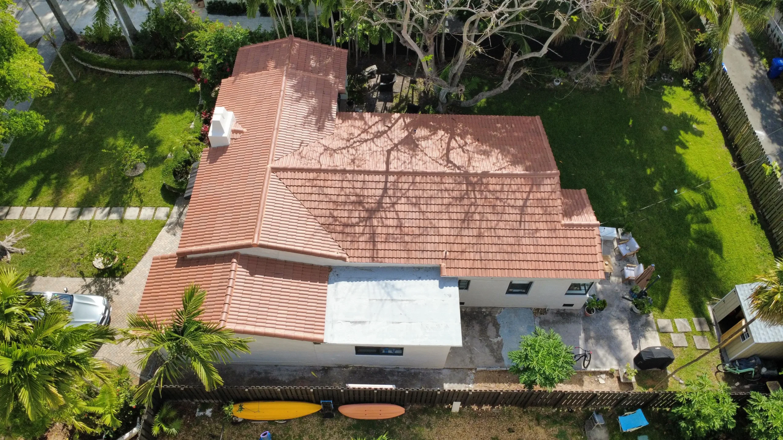 Aerial view of terracotta tile roof with surrounding yard