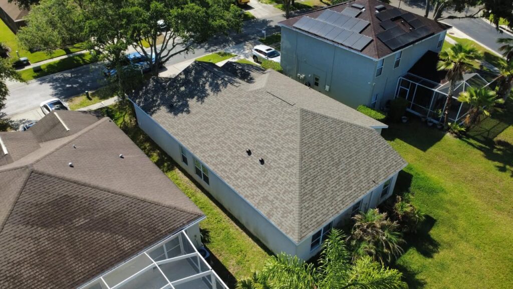 Completed Driftwood shingle roof and home exterior in Valrico, Florida