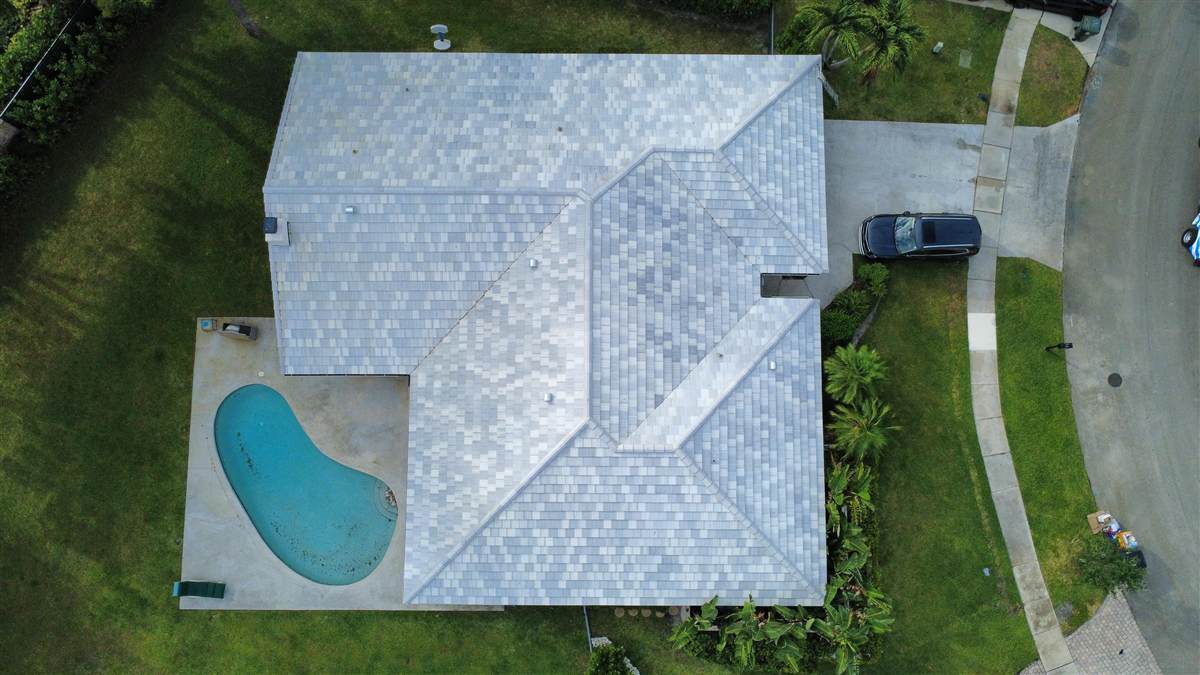 Completed SAXONY 900 Slate tile roof in Mottled White Blend by Maze Roofing in Boca Raton, Florida