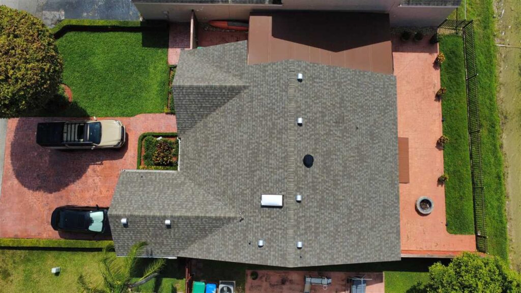 GAF shingle roof in Weathered Wood replacement carried out by Maze Roofing on a home in Hialeah, Florida