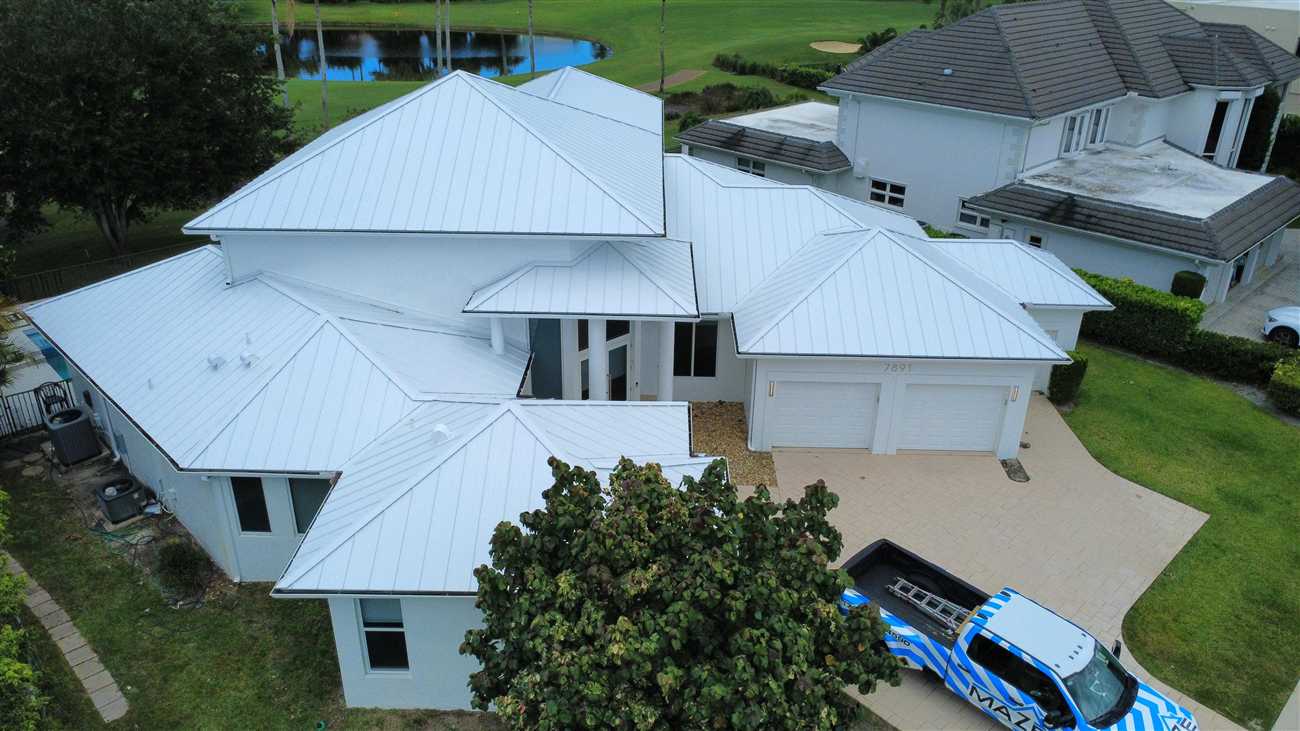 Close view of standing seam metal roofing panels in Regal White on a Maze Roofing project in Boca Raton, Florida