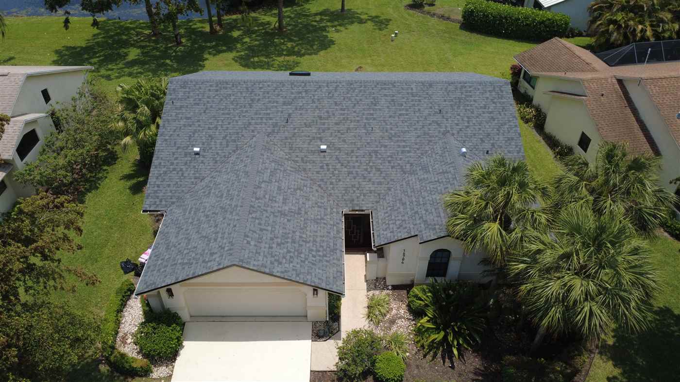 New Owens Corning shingle roof in Estate Gray installed by Maze Roofing on a home in Delray Beach, Florida