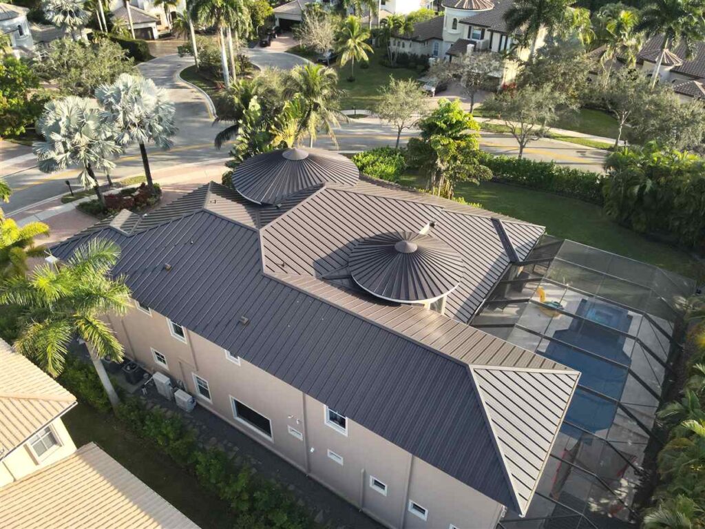 standing seam metal roof in Dark Bronze replacement carried out by Maze Roofing on a home in Parkland, Florida