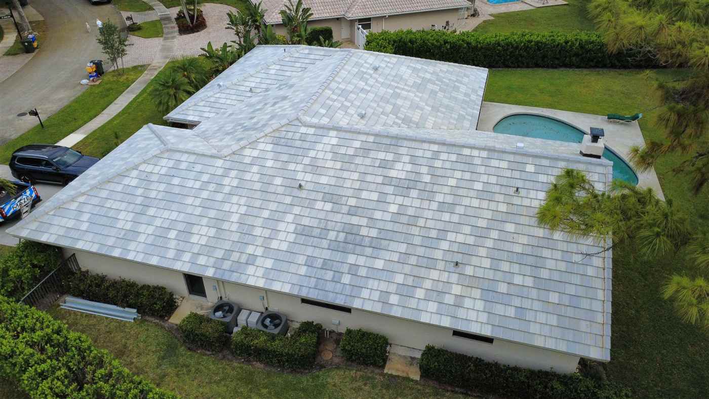 New SAXONY 900 Slate tile roof in Mottled White Blend installed by Maze Roofing on a home in Boca Raton, Florida