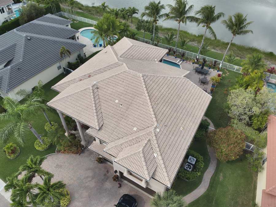 Aerial view of a completed tile roof replacement on a home in Wellington, Florida Aerial view of a completed tile roof replacement on a home in Wellington, Florida