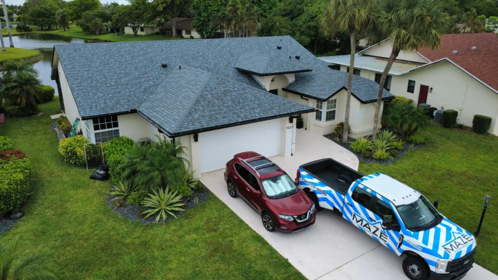 Blue asphalt shingle roof aerial view