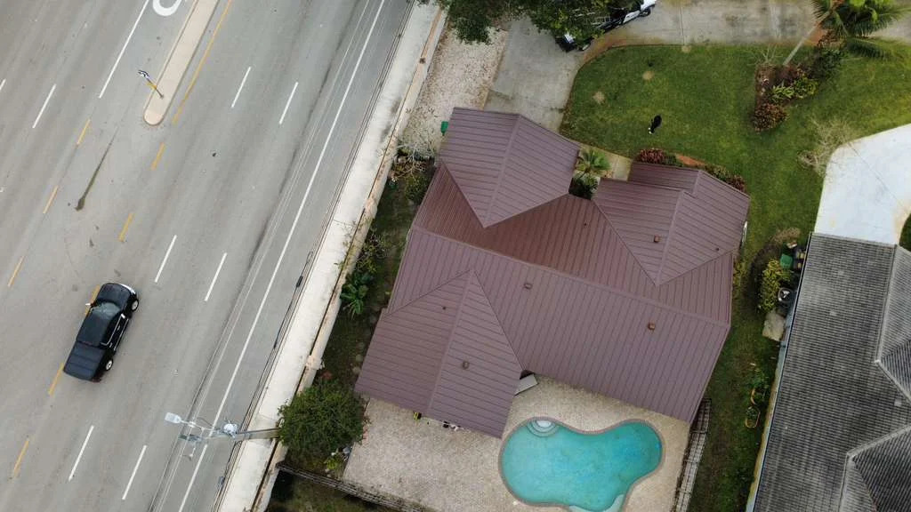Brown standing seam metal roof aerial view