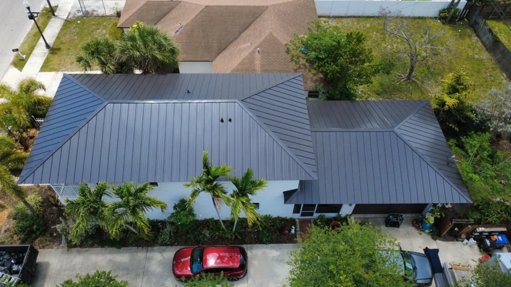 Complete dark gray metal roof replacement