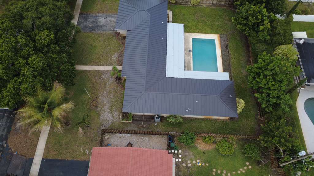 Residential metal roof replacement aerial photo