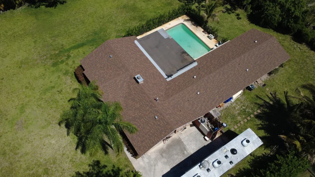 Large home roof replacement aerial view