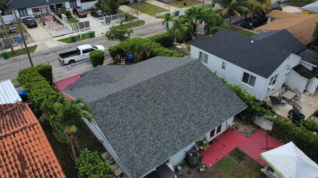 Gray asphalt roof installation