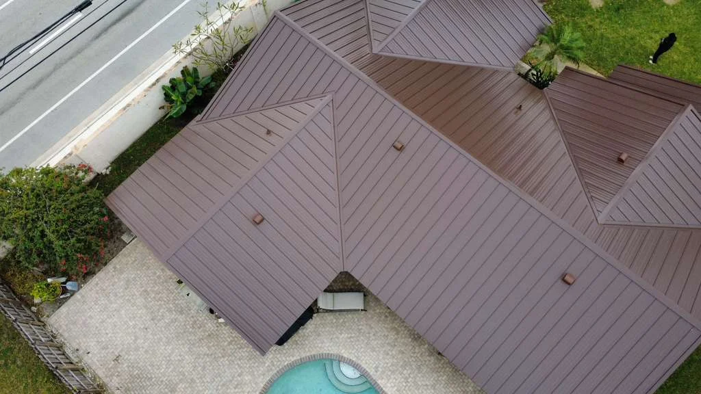 Residential brown metal roof replacement