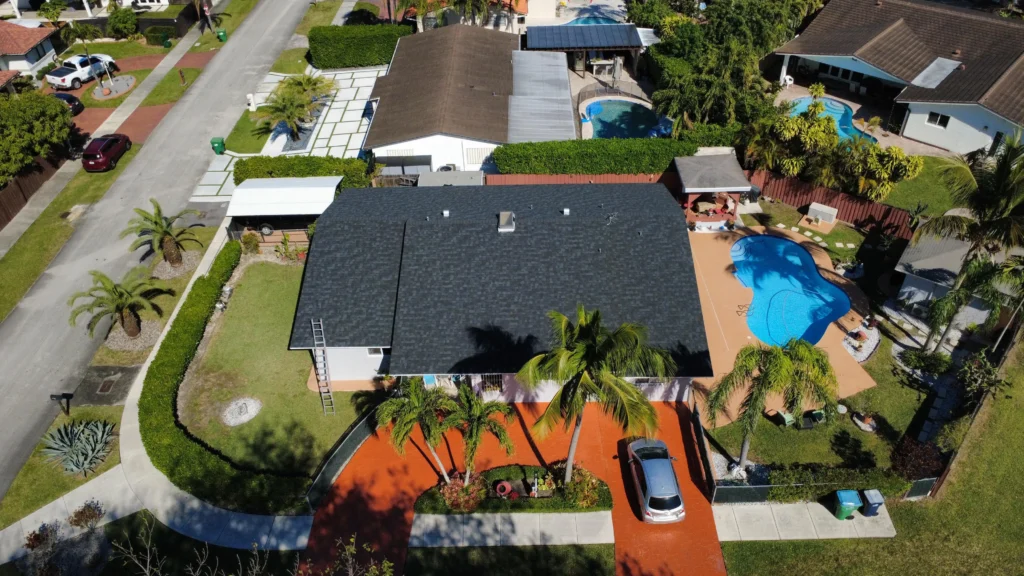 Completed black shingle roofing system