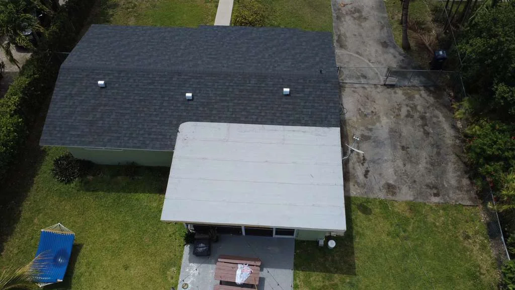 Dark shingle roof installation
