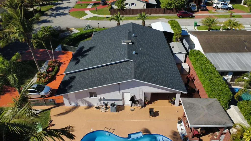 Dark shingle roof over residential home