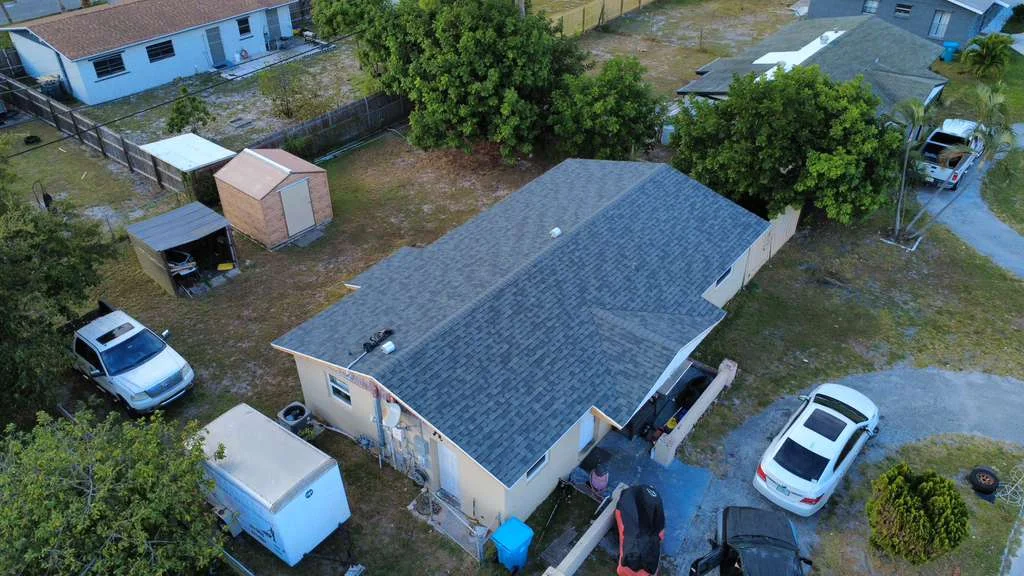 House roof replacement with gray asphalt shingles