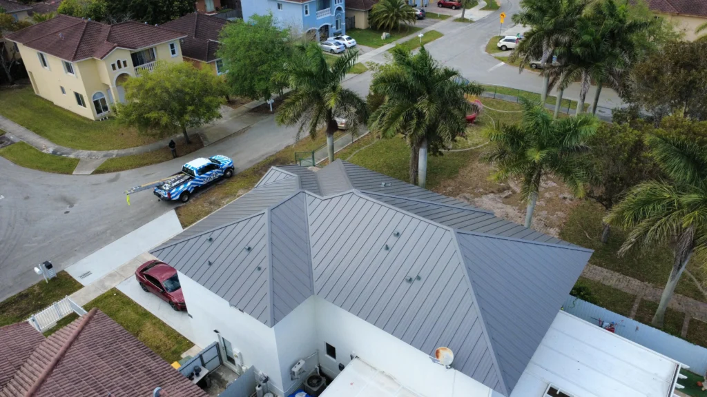 Modern gray metal roof installation on home