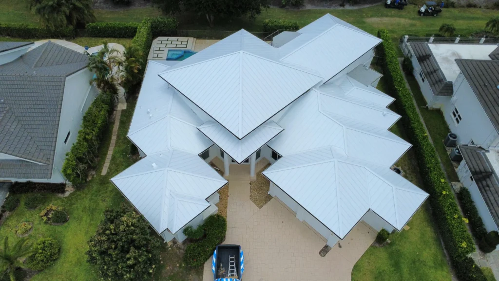 Luxury home with white metal roof
