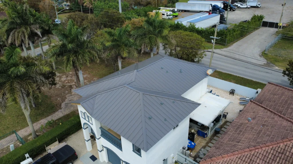 Gray metal roof replacement aerial photo