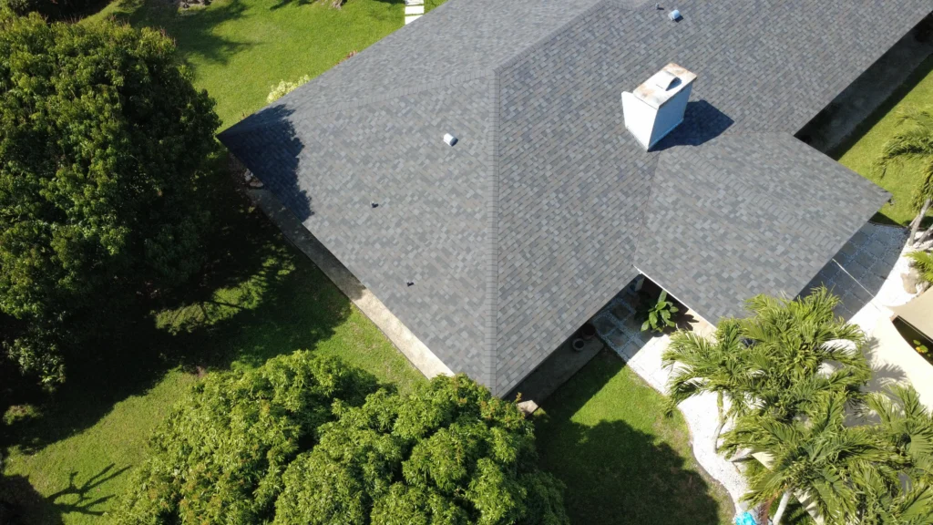 New gray shingle roof installation
