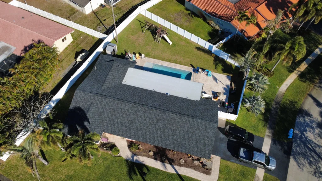 Residential roof replacement with black shingles