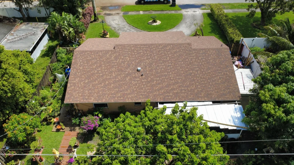 Brown shingle roof replacement aerial view
