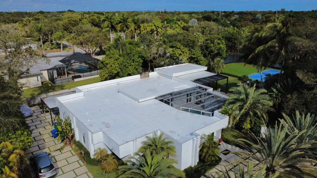 White flat roof with rooftop details