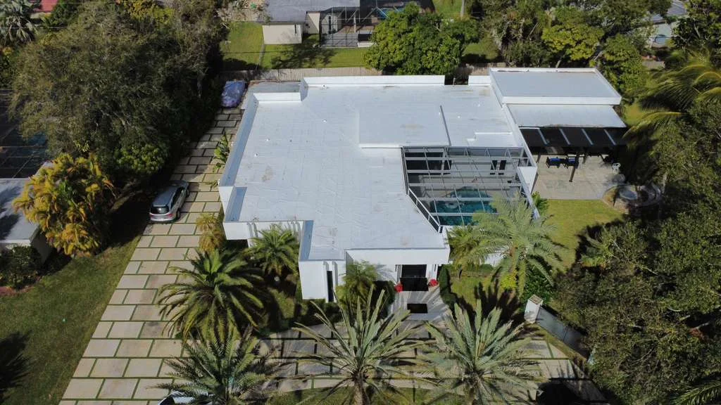 White commercial flat roof from above